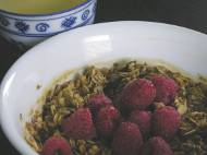 Cold oats with ground flaxseed, pumpkin seeds, raspberries, cinnamon, molasses, agave nectar, and almond milk